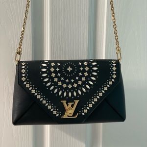 Louis Vuitton love note bag.